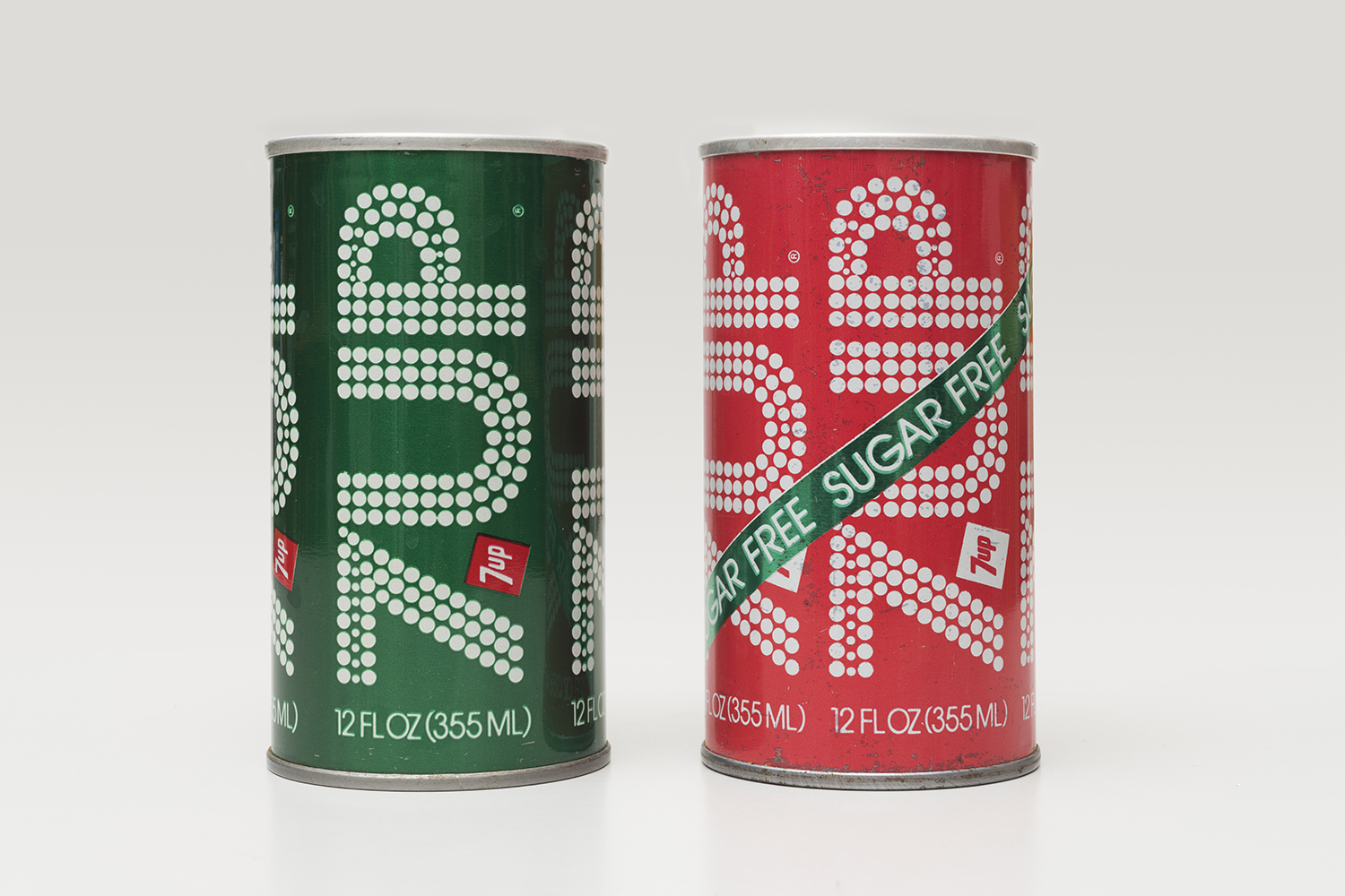 7Up Cans (green and red) from the collection of Tim Samuelson. Photograph: James Prinz Photography, Chicago. 7Up Cans (green and red) from the collection of Tim Samuelson. Photograph: James Prinz Photography, Chicago.